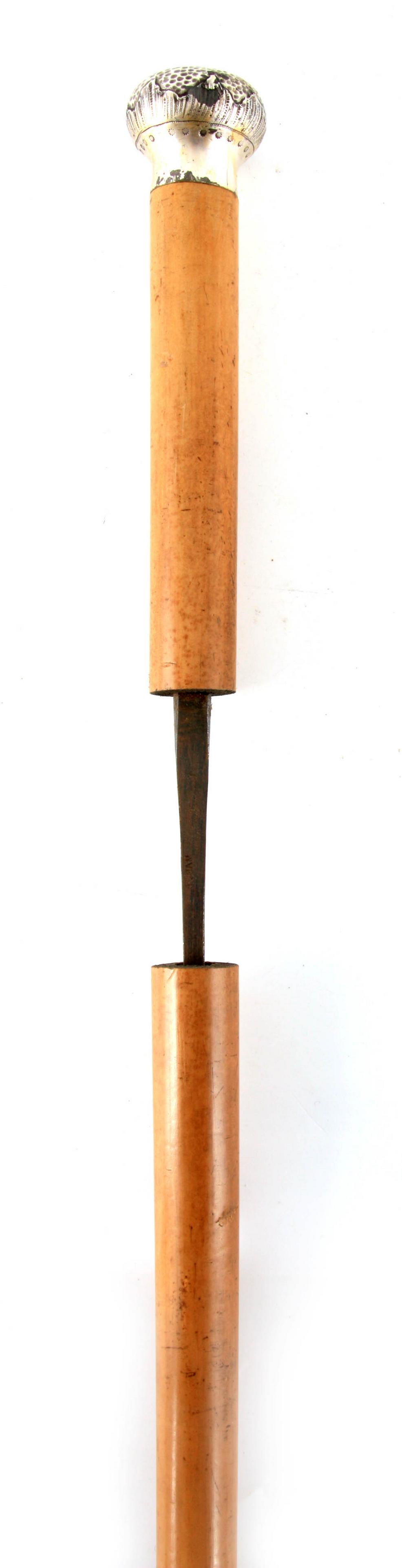 A 19TH CENTURY SILVER METAL TOPPED MALACCA SWORD STICK (1 of 1)