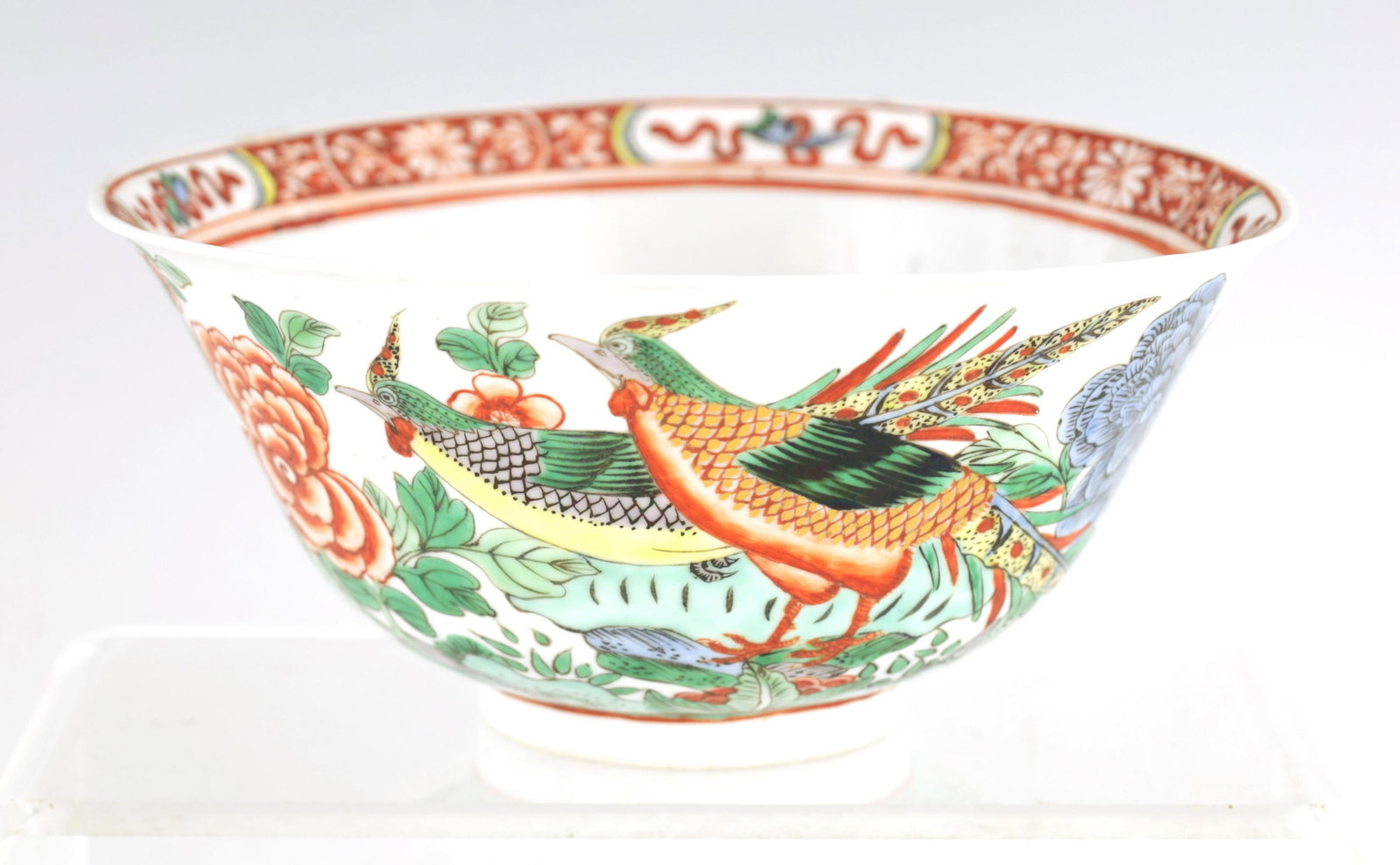 AN 18TH CENTURY CHINESE FAMILLE VERTE PORCELAIN BO: AN 18TH CENTURY CHINESE FAMILLE VERTE PORCELAIN BOWL BEARING KANGXI MARKS decorated with birds amongst flowering branch work 17.5cm diameter 8.5cm high