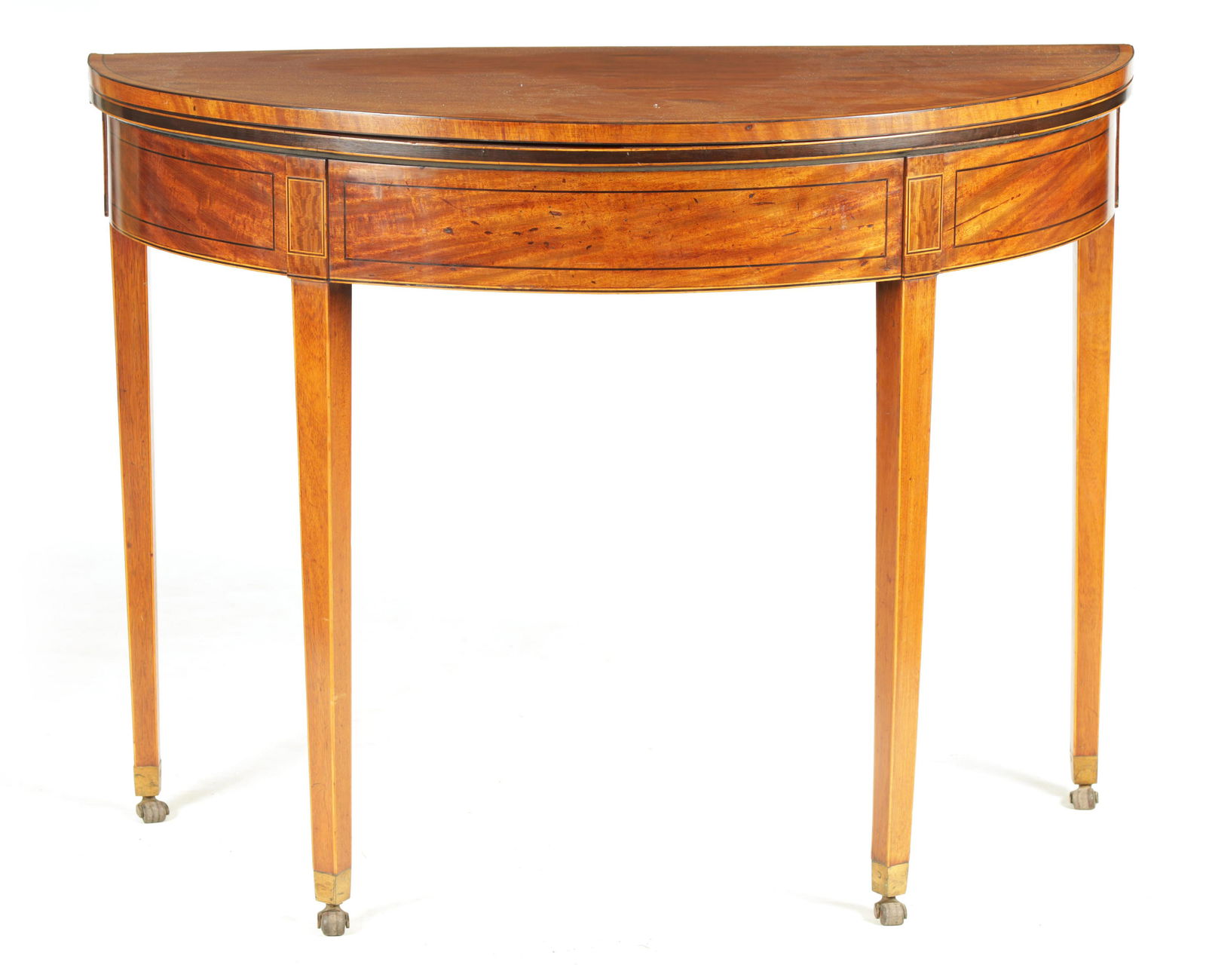 A GEORGE III FIGURED SATINWOOD D END TEA TABLE wit: A GEORGE III FIGURED SATINWOOD D END TEA TABLE with hinged top and double gate rear legs; standing on tapering square legs with brass toe leather casters 98cm wide 45cm deep 74cm high