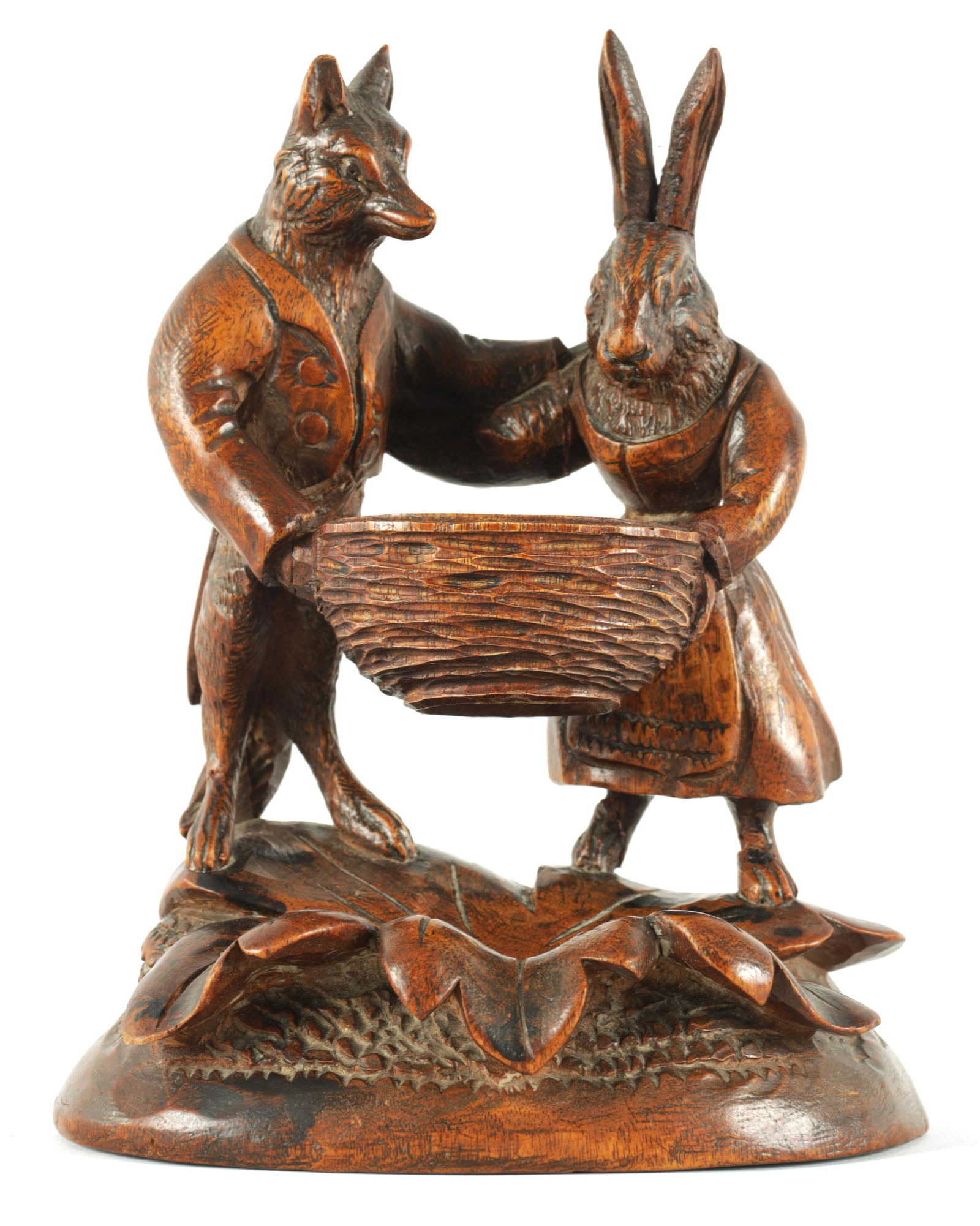 A 19TH CENTURY BLACK FOREST CARVED LINDEN WOOD PEN REST (1 of 7)