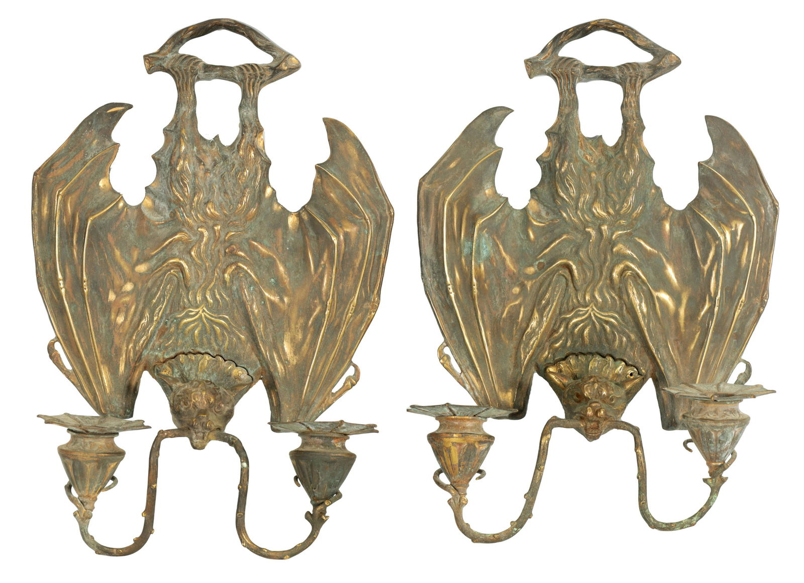 A PAIR OF BRONZE HANGING BAT WALL SCONCES AFTER WILLIAM TONKS & SONS FOR LIBERTY'S: A PAIR OF BRONZE HANGING BAT WALL SCONCES AFTER WILLIAM TONKS & SONS FOR LIBERTY'S designed at the Keswick School of Industrial Arts the stylised bats holding a simulated vine with two sconces with re