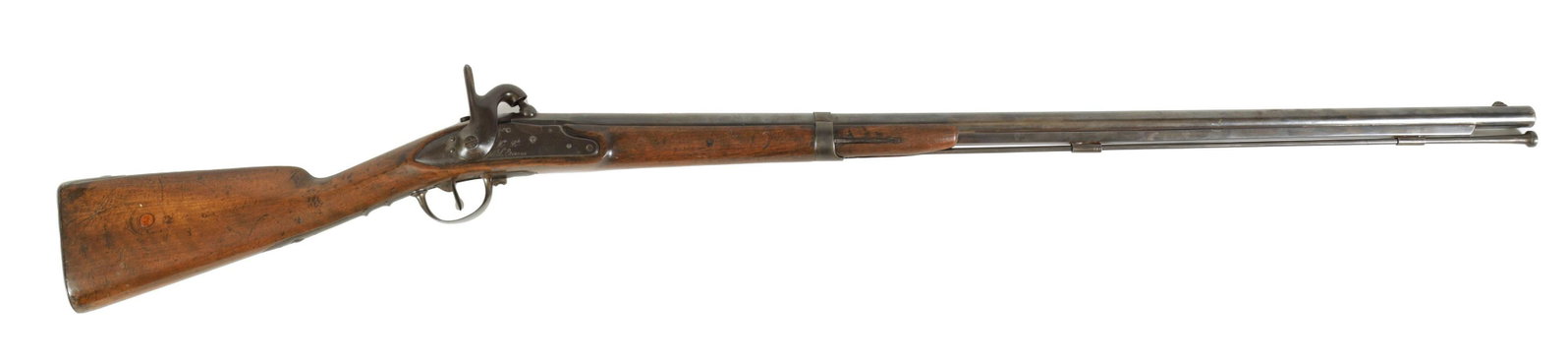 AN EARLY 19TH CENTURY FRENCH RIFLE: AN EARLY 19TH CENTURY FRENCH RIFLE with half walnut stock and signed lock plate, converted from flintlock to percussion, proof marks to breach. (136cm overall)