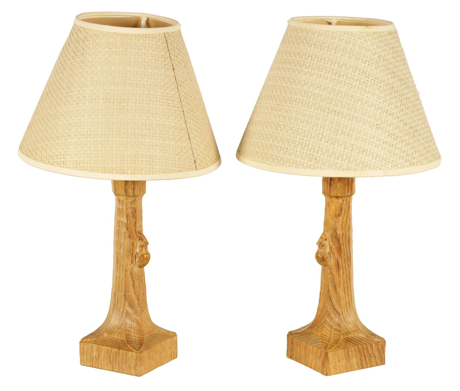 A PAIR OF ROBERT 'MOUSEMAN' THOMPSON AZED OAK TABLE LAMPS: A PAIR OF ROBERT 'MOUSEMAN' THOMPSON AZED OAK TABLE LAMPS with octagonal tapering stems having signature carved mice. (26cm high without fittings )