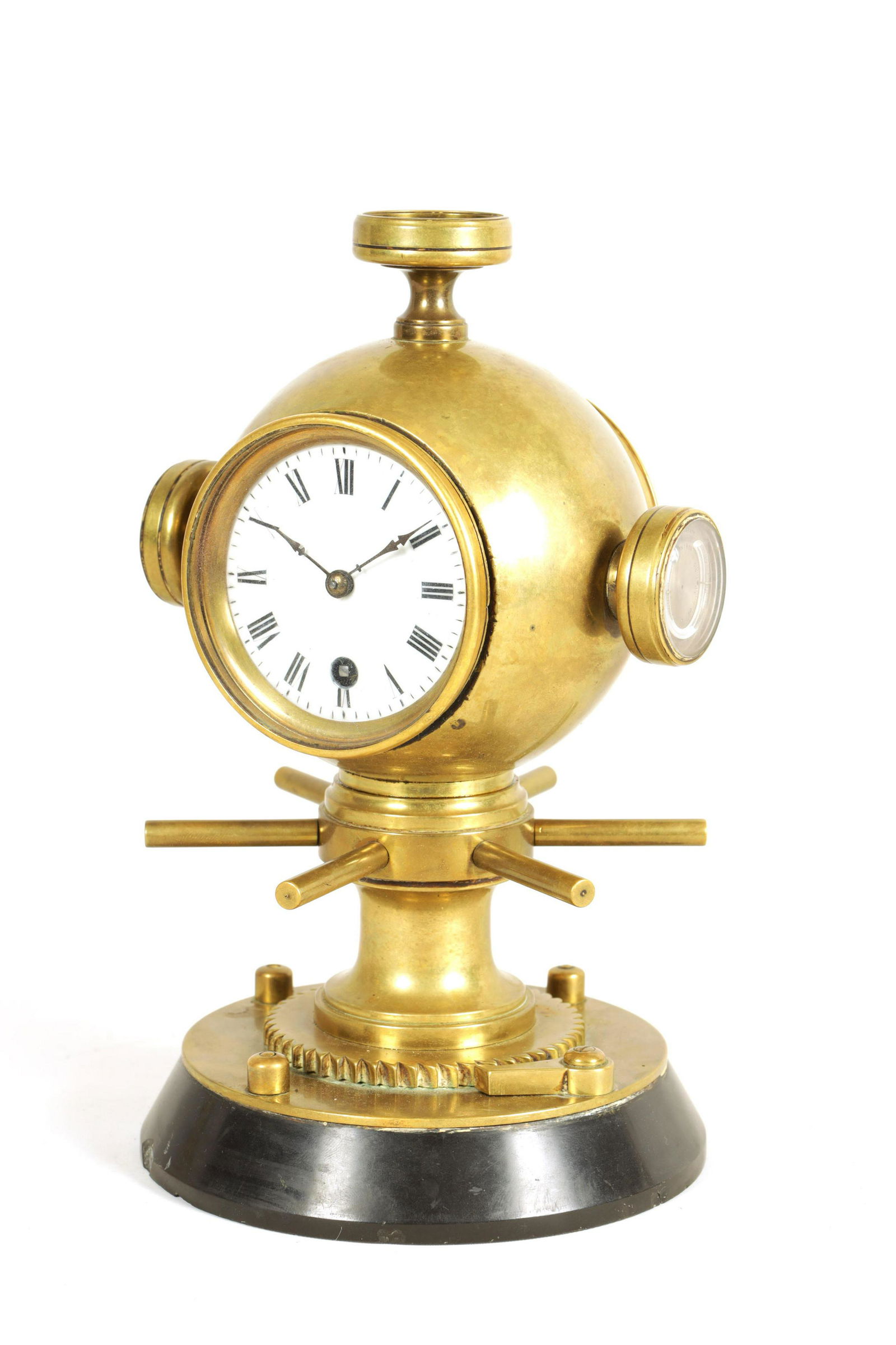 A LATE 19TH CENTURY FRENCH INDUSTRIAL DESK CLOCK COMPENDIUM: A LATE 19TH CENTURY FRENCH INDUSTRIAL DESK CLOCK COMPENDIUM the brass case modelled as a ship's capstan with spherical ball enclosing a barometer, clock, two thermometers and a compass on a rotating b
