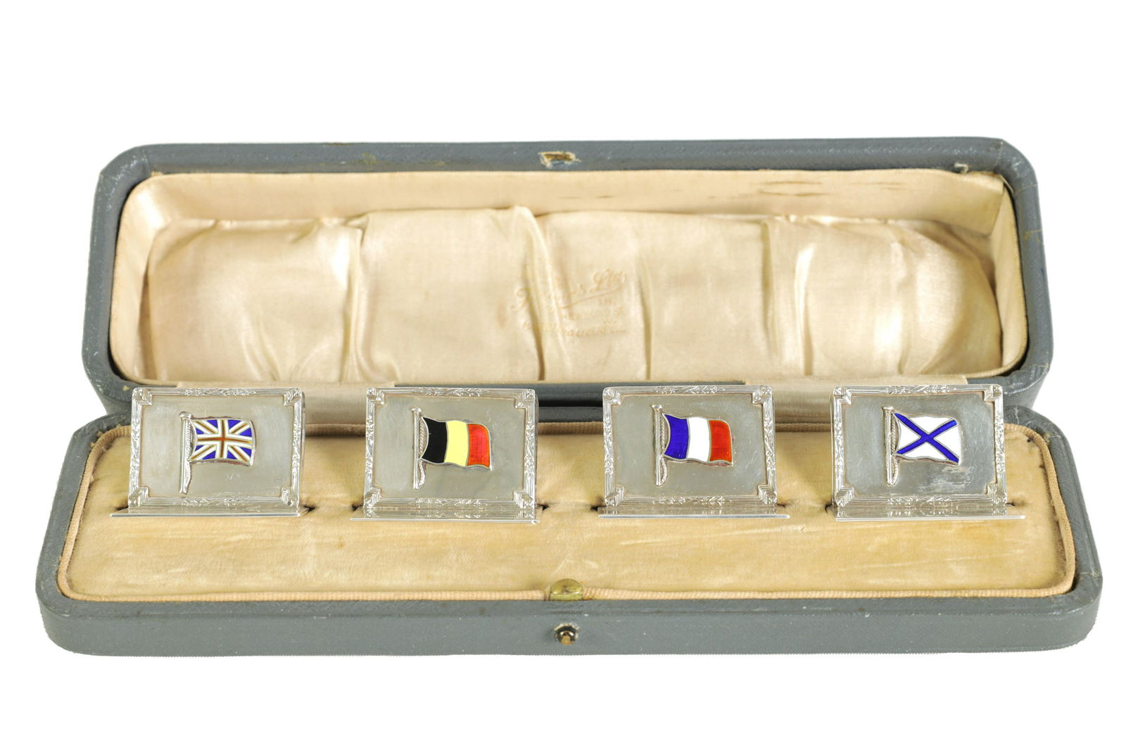 A CASED SET OF FOUR SILVER AND ENAMEL FLAG MENU HOLDERS (1 of 8)