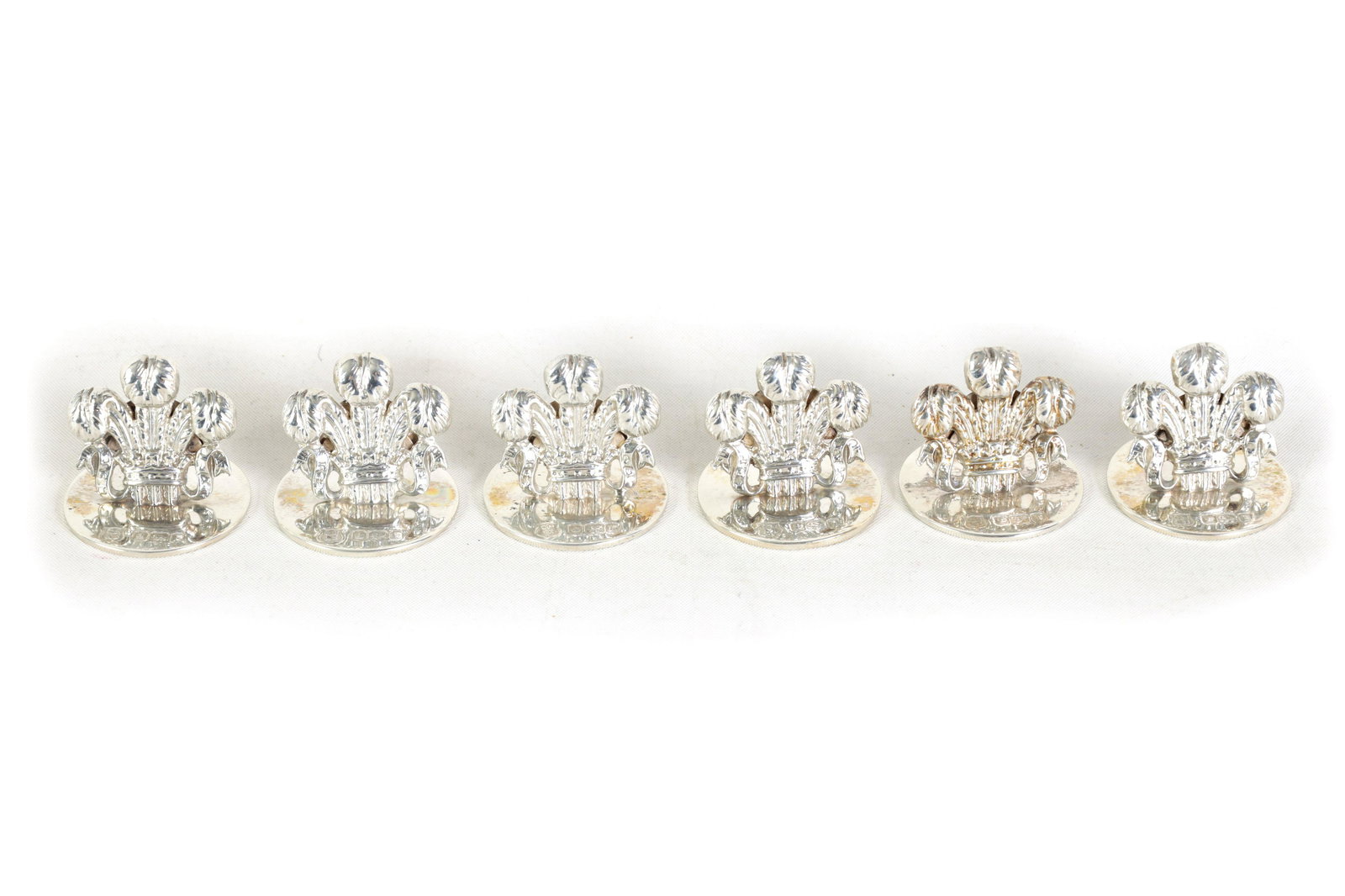 A SET OF SIX PRINCE OF WALES SILVER MENU HOLDERS (1 of 7)