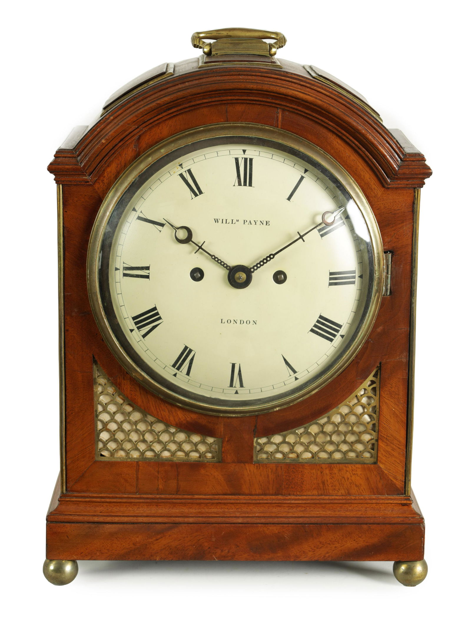 WILLIAM PAYNE, LONDON. A REGENCY TRIPLE PAD TOP MAHOGANY BRACKET CLOCK: WILLIAM PAYNE, LONDON. A REGENCY TRIPLE PAD TOP MAHOGANY BRACKET CLOCK with arched moulded top and pierced brass fish scale sound frets to the front and sides enclosing an 8" convex painted dial with