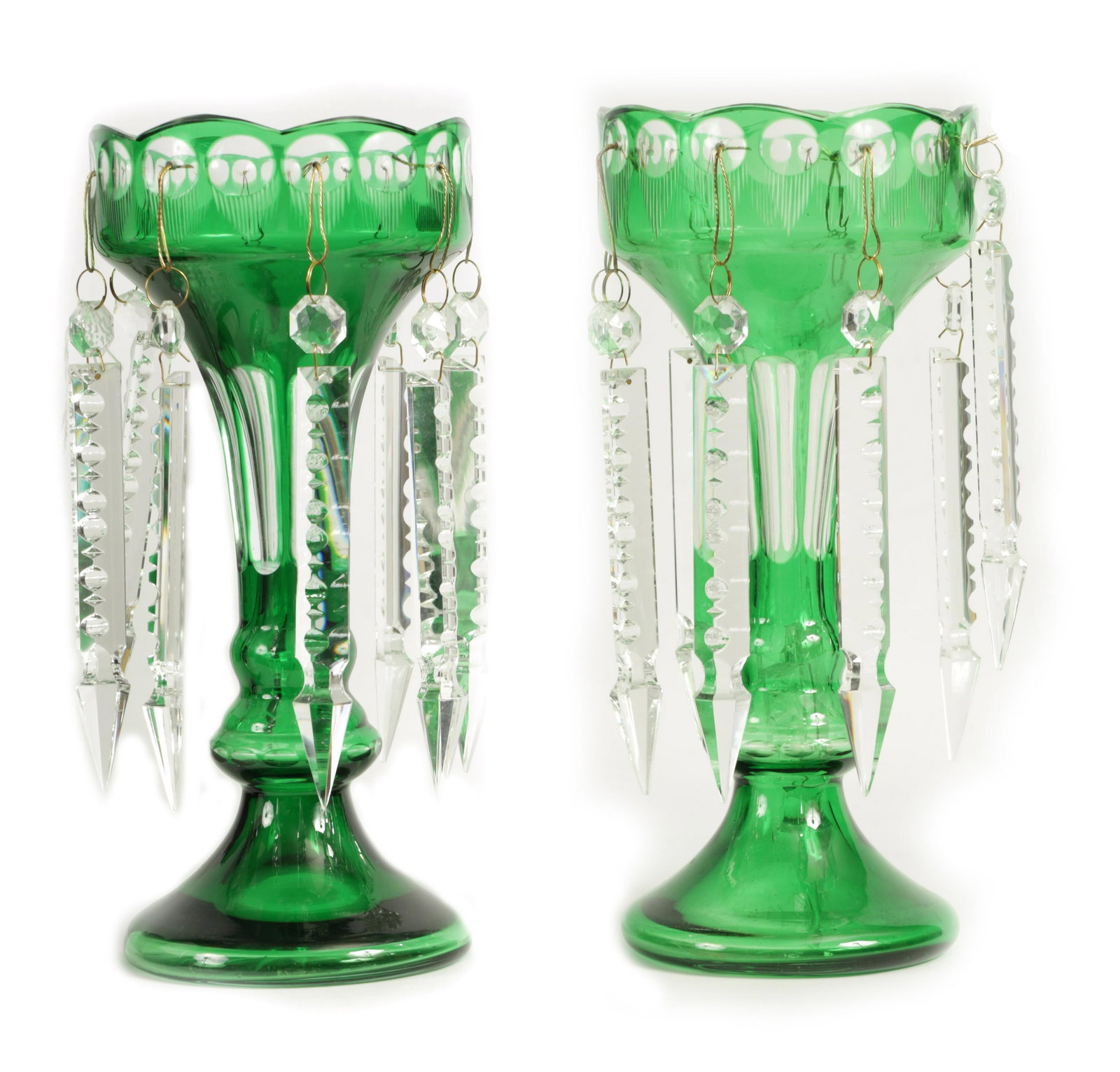 A PAIR OF 19TH CENTURY GREEN AND CLEAR GLASS LUSTRES: A PAIR OF 19TH CENTURY GREEN AND CLEAR GLASS LUSTRES A PAIR OF 19TH CENTURY GREEN AND CLEAR GLASS LUSTRES with facet cut tapering bodies and angled droppers. (30.5cm high )