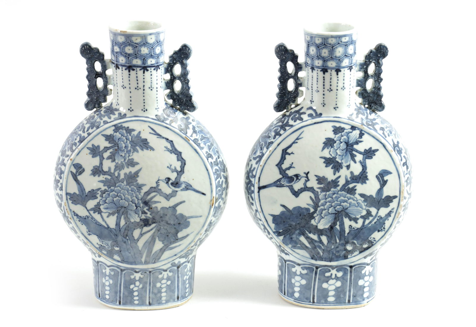 A PAIR OF 19TH CENTURY CHINESE BLUE AND WHITE MOON FLASKS: A PAIR OF 19TH CENTURY CHINESE BLUE AND WHITE MOON FLASKS A PAIR OF 19TH CENTURY CHINESE BLUE AND WHITE MOON FLASKS decorated with birds amongst flowering branch work - signed with four character mark