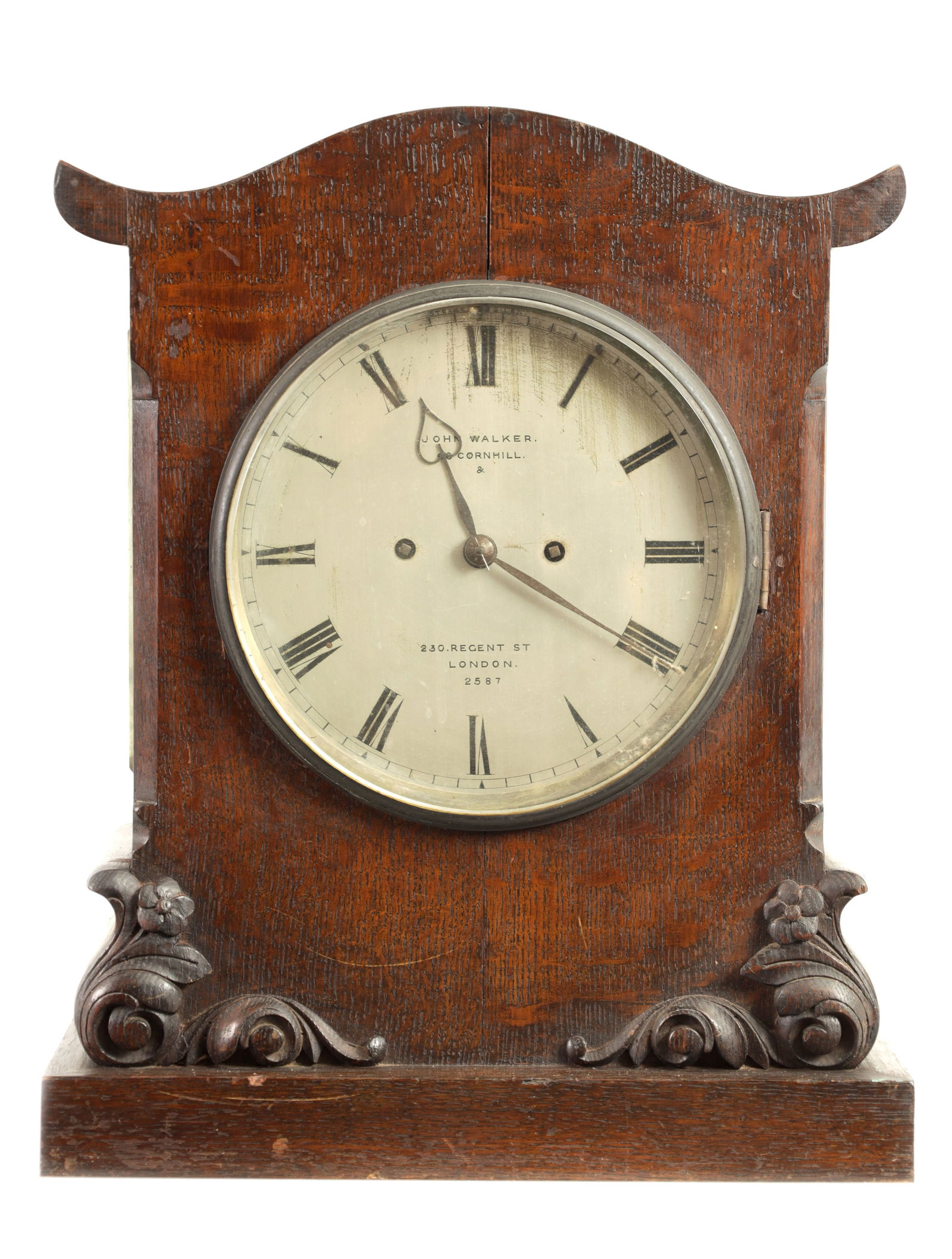 JOHN WALKER, LONDON. A MID 19TH CENTURY DOUBLE FUSEE BRACKET CLOCK: JOHN WALKER, LONDON. A MID 19TH CENTURY DOUBLE FUSEE BRACKET CLOCK the oak case with shaped top and canted corners above a carved base enclosing an 8" silvered dial with Roman numerals fronting an eig