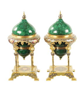 A FINE PAIR OF FRENCH ORMOLU, CHAMPLEVE ENAMEL AND CERAMIC FAUX MALACHITE CASOLETTES: A FINE PAIR OF FRENCH ORMOLU, CHAMPLEVE ENAMEL AND CERAMIC FAUX MALACHITE CASOLETTES having domed tops mounted in ormolu stands with champleve enamel decoration raised on four knopped columns on squar