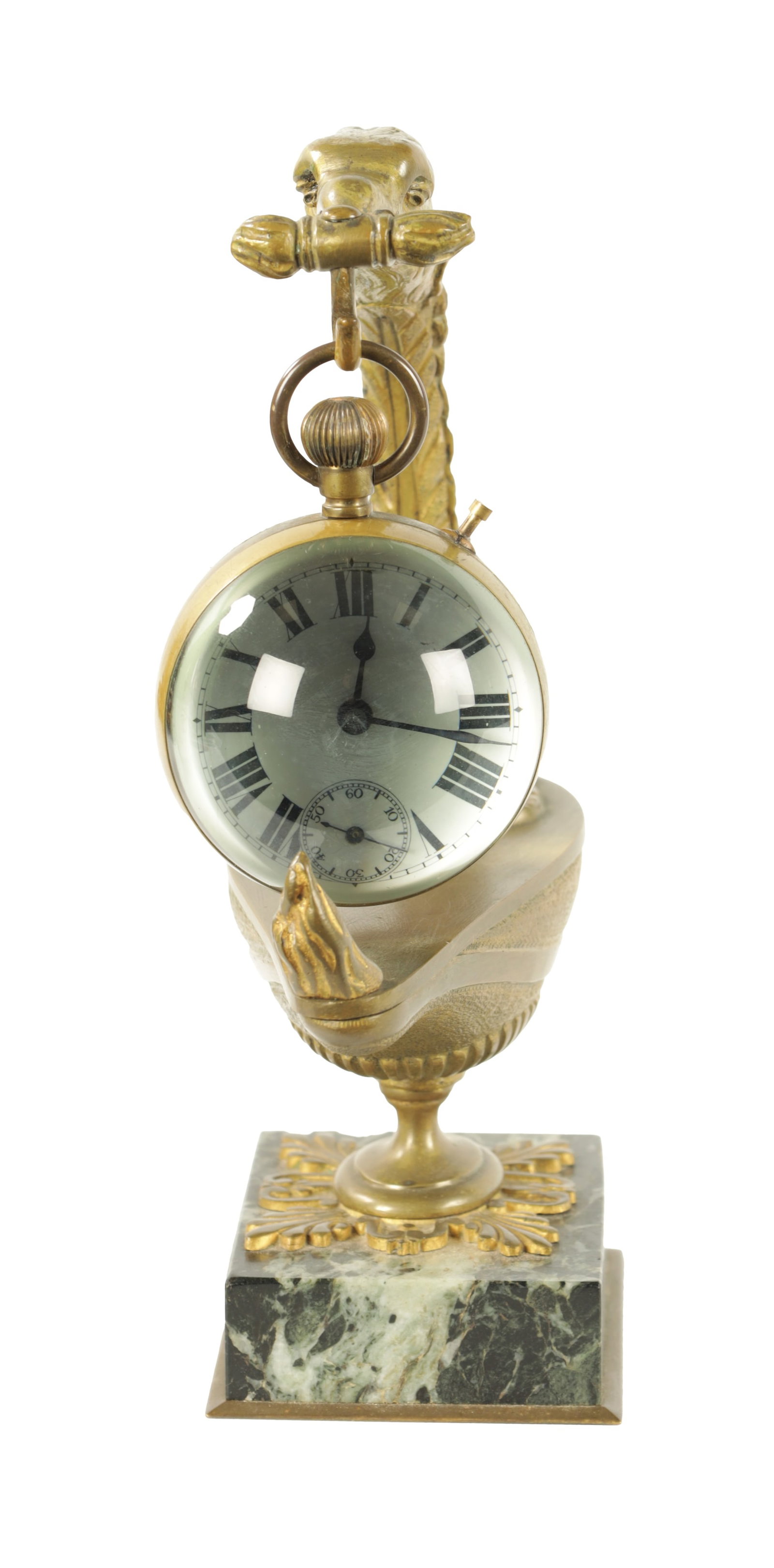 AN EMPIRE STYLE ORMOLU DESK CLOCK ON STAND: AN EMPIRE STYLE ORMOLU DESK CLOCK ON STAND modelled as an oil lamp mounted on an Verdi Antico marble base with lion mask and eagles head supporting a magnified spherical clock with enamel Roman dial w