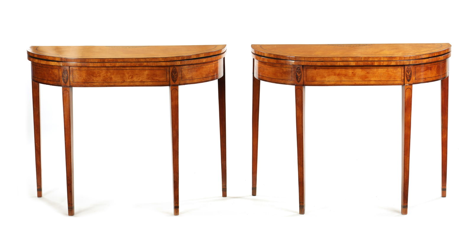 ATT. WILLIAM MOORE, DUBLIN. A FINE PAIR OF GEORGE III IRISH EBONY STRUNG INLAID FIGURED SATINWOOD: ATT. WILLIAM MOORE, DUBLIN. A FINE PAIR OF GEORGE III IRISH EBONY STRUNG INLAID FIGURED SATINWOOD BOW FRONT CARD TABLES ATT. WILLIAM MOORE, DUBLIN. A FINE PAIR OF GEORGE III IRISH EBONY STRUNG INLAID