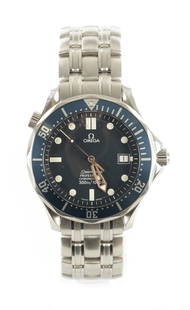 A GENTLEMAN'S STEEL OMEGA SEAMASTER PROFESSIONAL DIVER'S WRISTWATCH: A GENTLEMAN'S STEEL OMEGA SEAMASTER PROFESSIONAL DIVER'S WRISTWATCH on original steel bracelet, the watch with helium release valve, blue ceramic rotating bezel and sapphire crystal lens enclosing a
