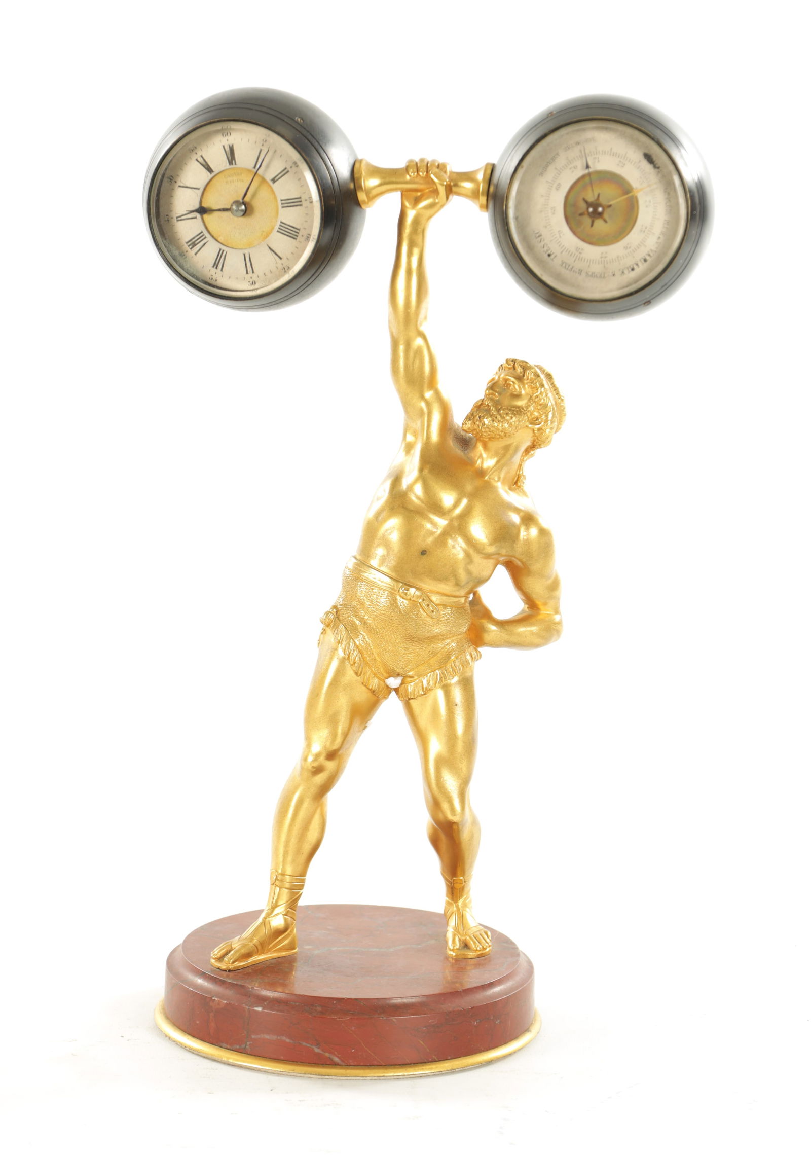A LATE 19TH CENTURY BRONZE, ORMOLU AND ROUGE MARBLE FRENCH INDUSTRIAL CLOCK COMPENDIUM: A LATE 19TH CENTURY BRONZE, ORMOLU AND ROUGE MARBLE FRENCH INDUSTRIAL CLOCK COMPENDIUM modelled as a figure standing on a rouge marble base lifting a barbell with two spherical weights containing a cl