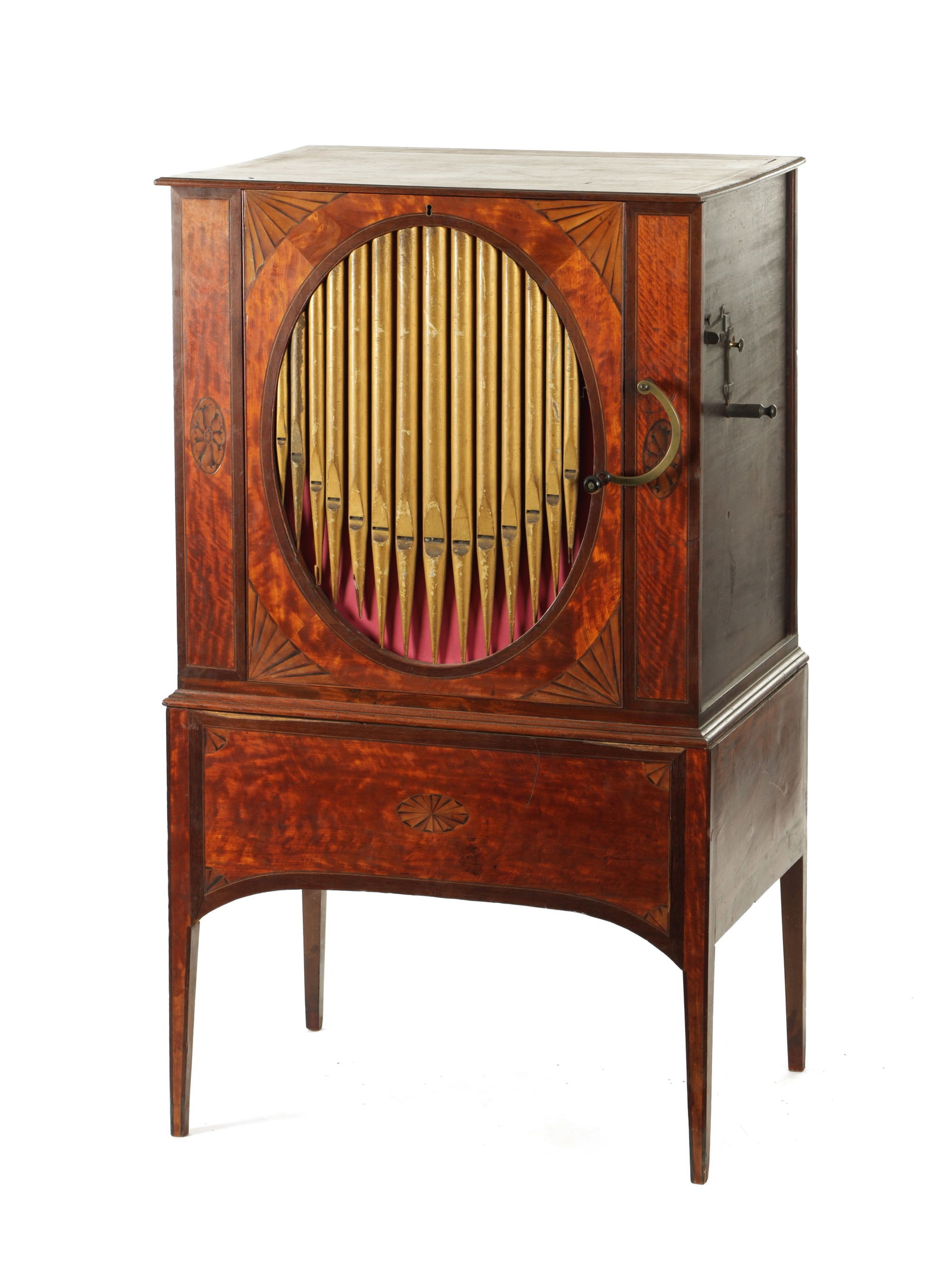 A GEORGE III INLAID SATINWOOD AND MAHOGANY BARREL ORGAN: A GEORGE III INLAID SATINWOOD AND MAHOGANY BARREL ORGAN the cabinet with simulated gilt pipes to the door, the organ with interchangeable cylinders (133cm high, 76cm wide)