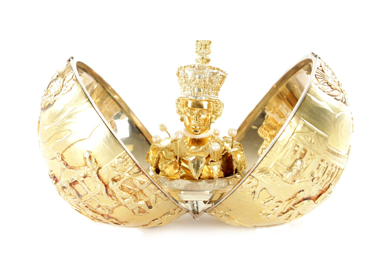 STUART DEVLIN - A SILVER GILT COMMEMORATIVE LONDON GLOBE: STUART DEVLIN - A SILVER GILT COMMEMORATIVE LONDON GLOBE No 14 for the Royal Silver Jubilee Coronation Anniversary. The hinged body opening to reveal the bust of Her Majesty Queen Elizabeth. London 19