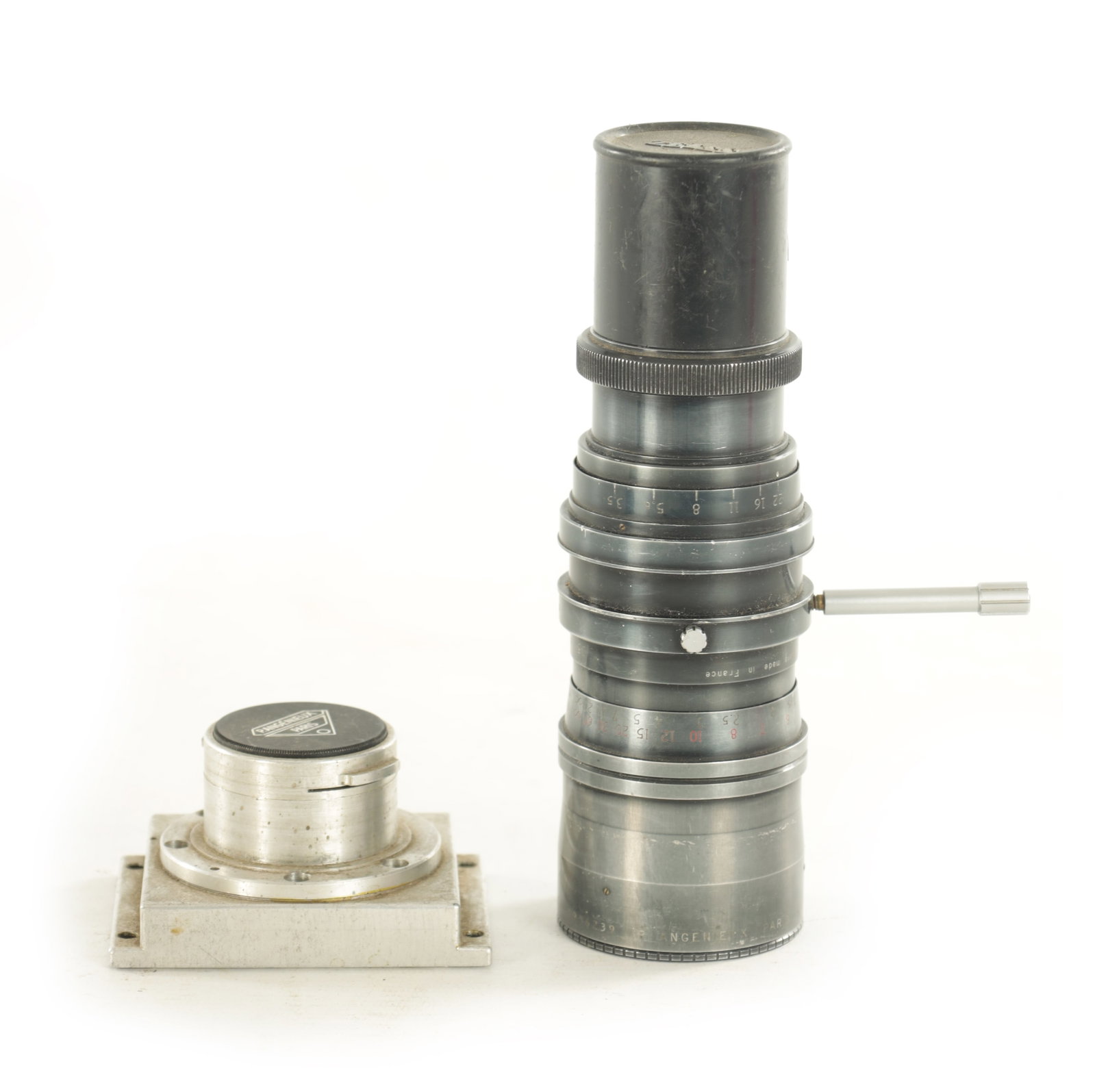 LENSES AND ATTACHMENTS BY PIERRE ANGENIEUX: LENSES AND ATTACHMENTS BY PIERRE ANGENIEUX including a zoom type LA2 f/3.5 - 35/140mm #906239 and a machined mount with Typr R2 retrofocus lens. (19cm long 58mm diameter)