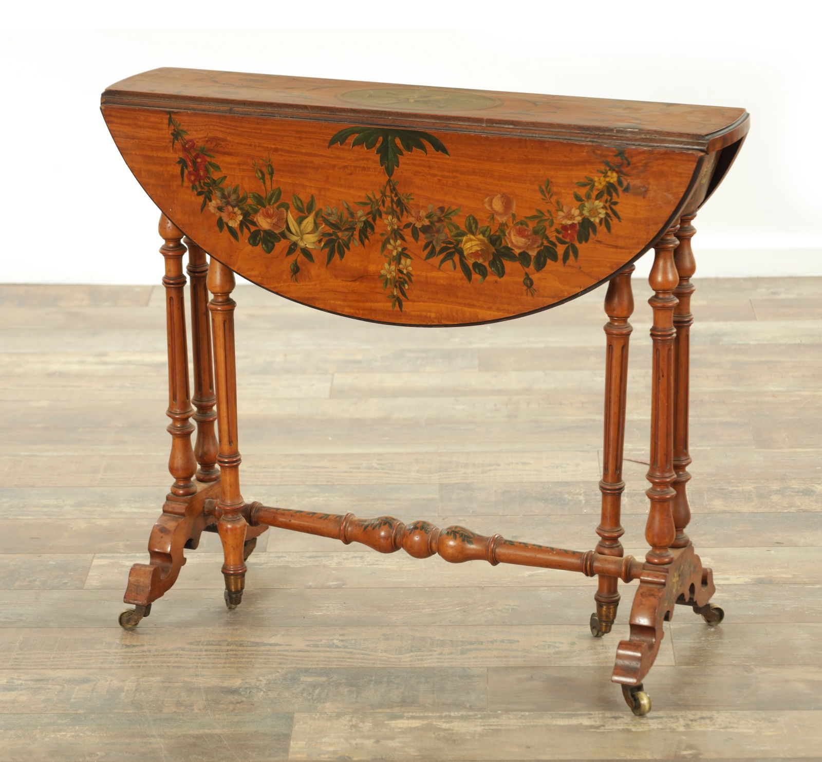 A 19TH CENTURY PAINTED SATINWOOD SUTHERLAND TABLE (1 of 11)