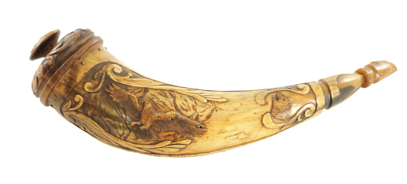AN UNUSUAL 19TH CENTURY AMERICAN CARVED HORN POWDER FLASK: AN UNUSUAL 19TH CENTURY AMERICAN CARVED HORN POWDER FLASK finely carved with mountain and landscape scenes depicting a golden eagle and boar's head to one side and bears on floating logs and a stags h
