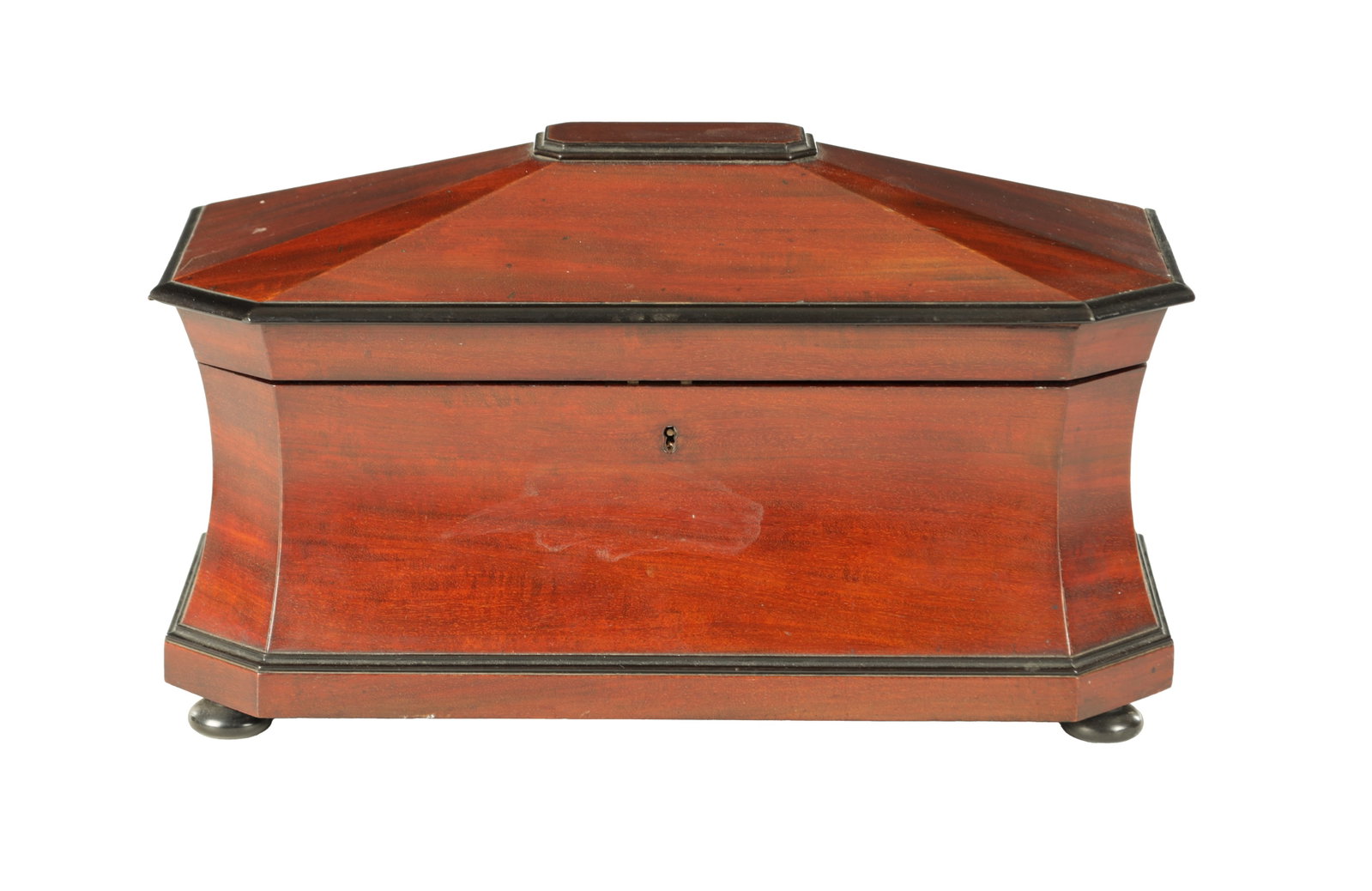 A WILLIAM IV MAHOGANY AND EBONISED TEA CADDY: A WILLIAM IV MAHOGANY AND EBONISED TEA CADDY of sarcophagus shape with hinged top having a fitted interior of two inner canisters and a cut glass mixing bowl to the centre. (41cm wide 22cm deep 23cm h
