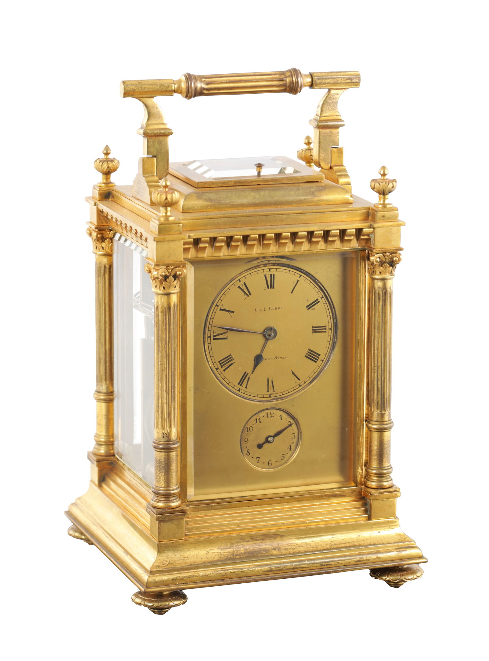 L & E FABRE. A LATE 19TH CENTURY OVERSIZED GRAND SONNERIE WESTMINSTER CHIME CARRIAGE CLOCK: L & E FABRE. A LATE 19TH CENTURY OVERSIZED GRAND SONNERIE WESTMINSTER CHIME CARRIAGE CLOCK the gilt brass case surmounted by a hinged handle and raised moulded glazed panel above four glazed panels an