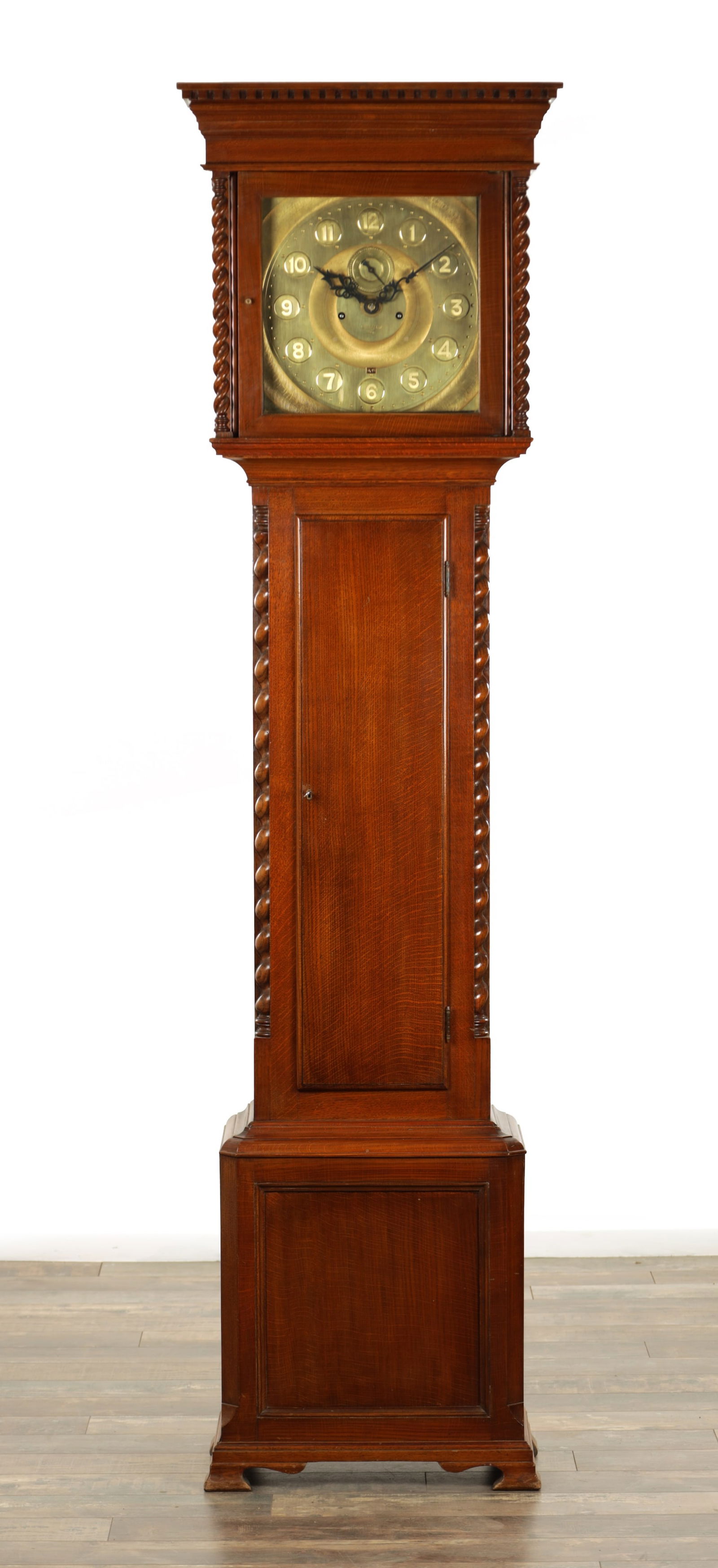 DAVID SCOTT, DATED 1927. AN UNUSUAL EARLY 20TH CENTURY OAK DOMESTIC REGULATOR EIGHT-DAY STRIKING: DAVID SCOTT, DATED 1927. AN UNUSUAL EARLY 20TH CENTURY OAK DOMESTIC REGULATOR EIGHT-DAY STRIKING LONGCASE CLOCK the 12" square brass dial with Arabic chapter ring enclosing seconds dial and days of th