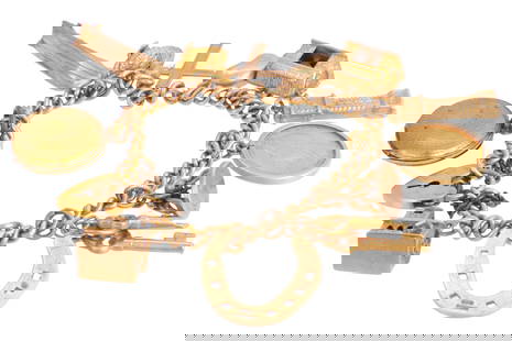 A 9CT GOLD CHARM BRACELET WITH SOVEREIGN: GOLD CHARM BRACELET WITH SOVEREIGN comprising a collection of 9ct, 1901 sovereign and yellow metal charms, a Stanhope which shows the Lord’s Prayer, an articulated blacksmith approx 41.96g gross wei