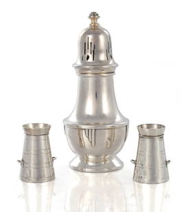 A MAPPIN & WEBB SILVER SUGAR CASTER AND A PAIR OF SALT AND PEPPER SHAKERS: A MAPPIN & WEBB SILVER SUGAR CASTER AND A PAIR OF SALT AND PEPPER SHAKERS the caster of shouldered baluster form with stylised art deco design, Birmingham, 1935, Mappin & Webb, the shakers formed as t