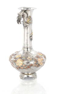 A JAPANESE MEIJI PERIOD SILVER AND ENAMEL VASE: A JAPANESE MEIJI PERIOD SILVER AND ENAMEL VASE decorated with an entwined dragon to the neck and enamel flower head to the body - signed beneath (24cm high )