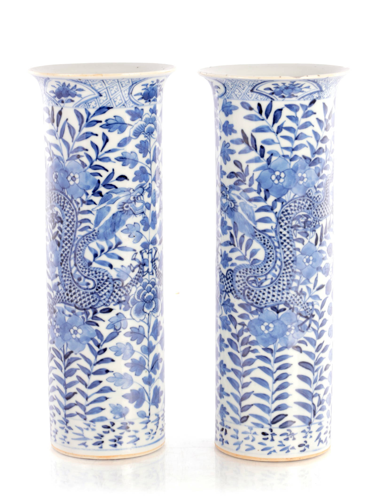 A PAIR OF BLUE AND WHITE CHINESE CYLINDRICAL VASES