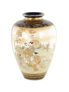 A LARGE MEIJI PERIOD JAPANESE SATSUMA PORCELAIN VASE: A LARGE MEIJI PERIOD JAPANESE SATSUMA PORCELAIN VASE, having a cobalt blue ground embellished in gilt foliage surrounding two large painted panels, the front with women and children in a landscape set