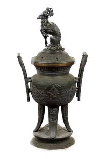 A LARGE LATE 19TH CENTURY CHINESE BRONZE CENSER AND COVER: A LARGE LATE 19TH CENTURY CHINESE BRONZE CENSER AND COVER, the domed cover with a large Qilin finial, the ovoid body covered in relief decoration depicting warriors, dragons, bats and stylised clouds.