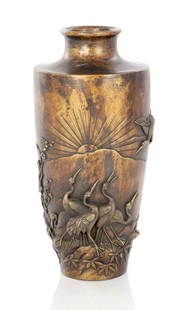 A FINE LARGE JAPANESE MEIJI PERIOD BRONZE SHOULDERED VASE: A FINE LARGE JAPANESE MEIJI PERIOD BRONZE SHOULDERED VASE decorated with a rising sun design with embossed storks and branchwork. (30cm high)