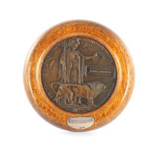 A WW1 OAK FRAMED BRONZE DEATH PENNY MEDALLION: A WW1 OAK FRAMED BRONZE DEATH PENNY MEDALLION, with silver presentation plaques inscribed "L/Cpl. John Fiddler, 15th Bat. Lanc. Fusiliers, Killed in Action, July 10th 1917". (17.5cm diameter)