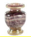 A REGENCY STYLE PURPLE BANDED FLUORITE URN