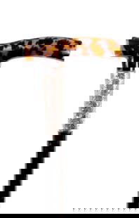 A LATE 19TH CENTURY PRESSED TORTOISESHELL TAU SHAPED WALKING CANE: A LATE 19TH CENTURY PRESSED TORTOISESHELL TAU SHAPED WALKING CANE with engraved silver collar, Birmingham, 1896; on a slender ebony shaft. (94cm long)