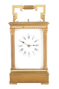 LOUIS FERNIER. A LATE 19TH CENTURY FRENCH STRIKING/REPEATING CARRIAGE CLOCK: LOUIS FERNIER. A LATE 19TH CENTURY FRENCH STRIKING/REPEATING CARRIAGE CLOCK, the brass glazed case with reeded Corinthian corner columns enclosing a white enamel dial with Roman numerals fronting an e