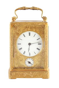 AUGUSTE A PARIS. A MID 19TH CENTURY FRENCH GILT ENGRAVED STRIKING CARRIAGE CLOCK: AUGUSTE A PARIS. A MID 19TH CENTURY FRENCH GILT ENGRAVED STRIKING CARRIAGE CLOCK, the one piece case with lions head and acanthus leaf handle enclosing a gilt engraved masked enamel dial with Roman nu