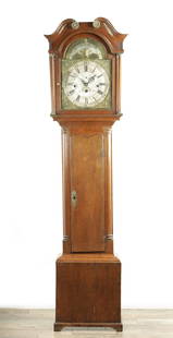 THOMAS SHAW, ASHBURN. A GEORGE III THREE TRAIN LONGCASE: THOMAS SHAW, ASHBURN. A GEORGE III THREE TRAIN LONGCASE, the oak case with swan neck pediment and turned quarter columns enclosing a 13" arched brass dial with rolling moon aperture fronting a weight