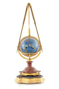 A 19TH CENTURY FRENCH ORMOLU AND ROUGE MARBLE MYSTERY CLOCK: A 19TH CENTURY FRENCH ORMOLU AND ROUGE MARBLE MYSTERY CLOCK, of Maritime or Masonic interest. The case modelled as a set of dividers supporting a weighted pendulum rotating above a blue globe with gil
