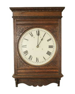 A LATE 19TH CENTURY AMERICAN WALL CLOCK MADE BY THE SELF WINDING CLOCK COMPANY, NEW YORK: A LATE 19TH CENTURY AMERICAN WALL CLOCK MADE BY THE SELF WINDING CLOCK COMPANY, NEW YORK, the oak case with carved acanthus leaf mouldings enclosing a 14" painted dial with Roman numerals fronting an