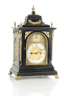 A SMALL LATE 19TH CENTURY ORMOLU MOUNTED DOUBLE FUSEE BRACKET CLOCK: A SMALL LATE 19TH CENTURY ORMOLU MOUNTED DOUBLE FUSEE BRACKET CLOCK, the ebonised case with bell top pediment and ormolu caryatid corners enclosing a 5" arched gilt brass dial with pierced spandrels