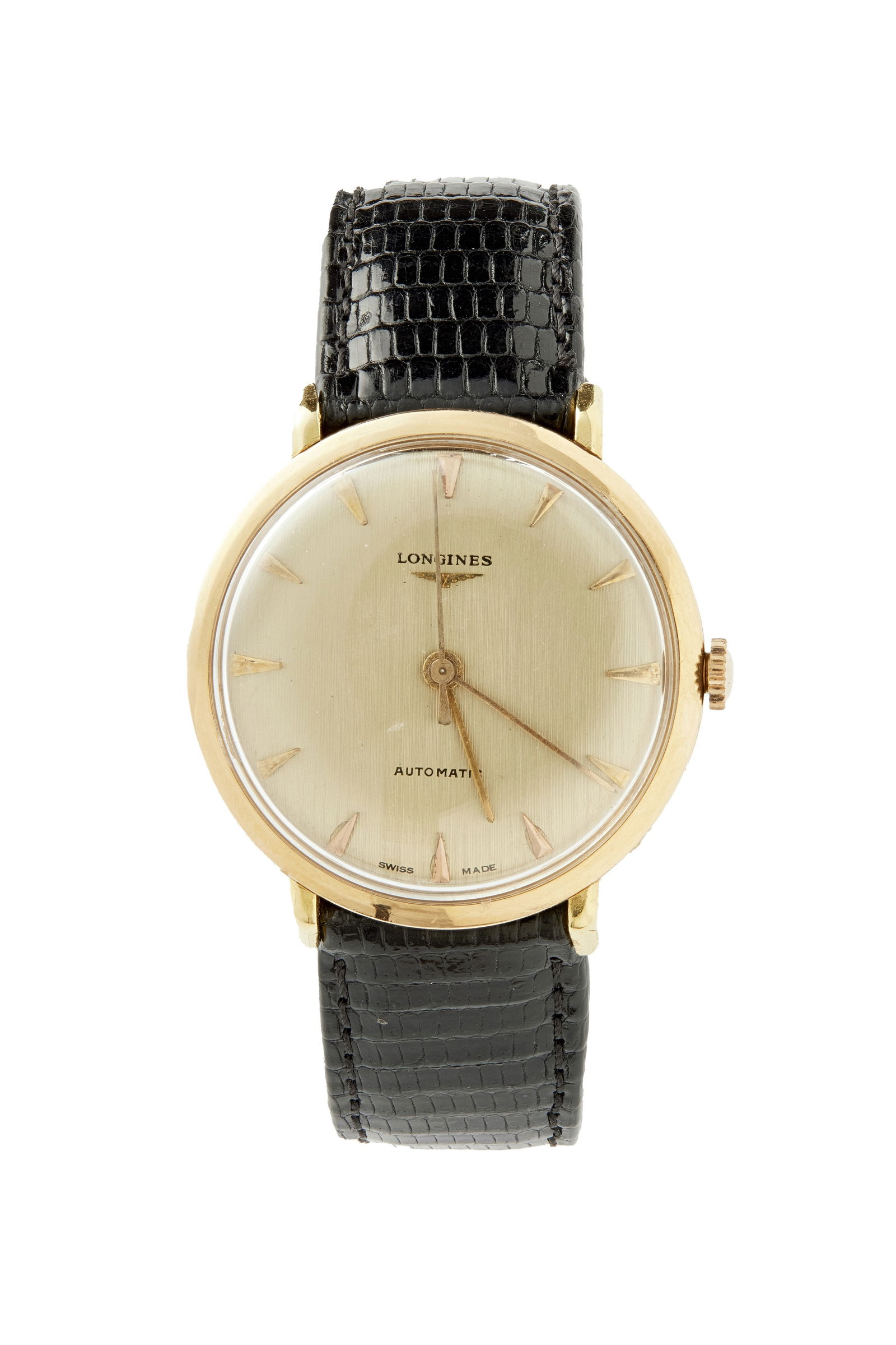 A 1960S 18CT GOLD LONGINES AUTOMATIC WRISTWATCH: A 1960S 18CT GOLD LONGINES AUTOMATIC WRISTWATCH the circular champagne dial with applied arrowhead hour markers and centre seconds, within a polished gold case, fitted to a black lizard leather strap,