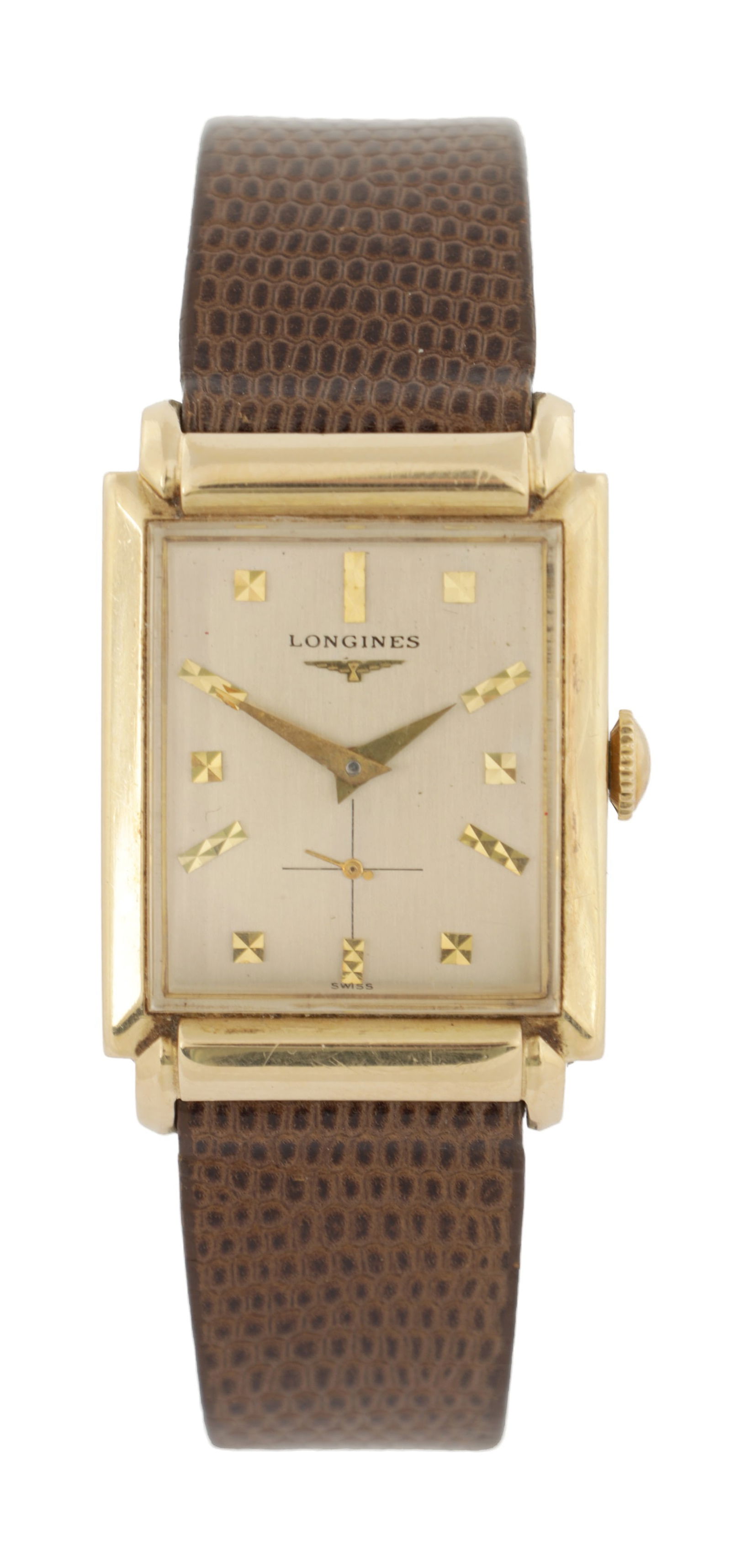 A GENTLEMAN'S 14CT GOLD VINTAGE LONGINES WRISTWATCH: A GENTLEMAN'S 14CT GOLD VINTAGE LONGINES WRISTWATCH on snake skin leather strap, the stylish rectangular case enclosing a silvered dial with faceted gold baton markers and subsidiary cross-hairs secon