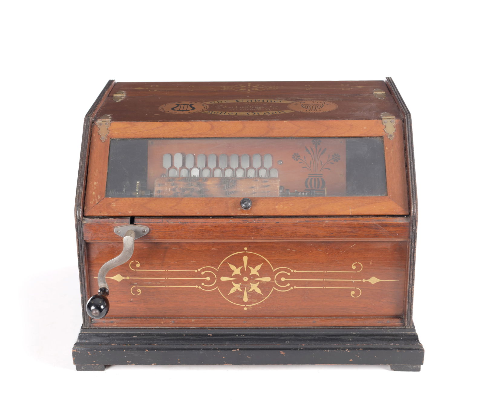 A 19TH CENTURY AMERICAN AUTOPHONE CABINET ROLLER ORGAN: A 19TH CENTURY AMERICAN AUTOPHONE CABINET ROLLER ORGAN, the case with gilt decoration and glazed hinged aperture enclosing a wooden pinbarrel organ. Has been serviced in recent years and is in good wo