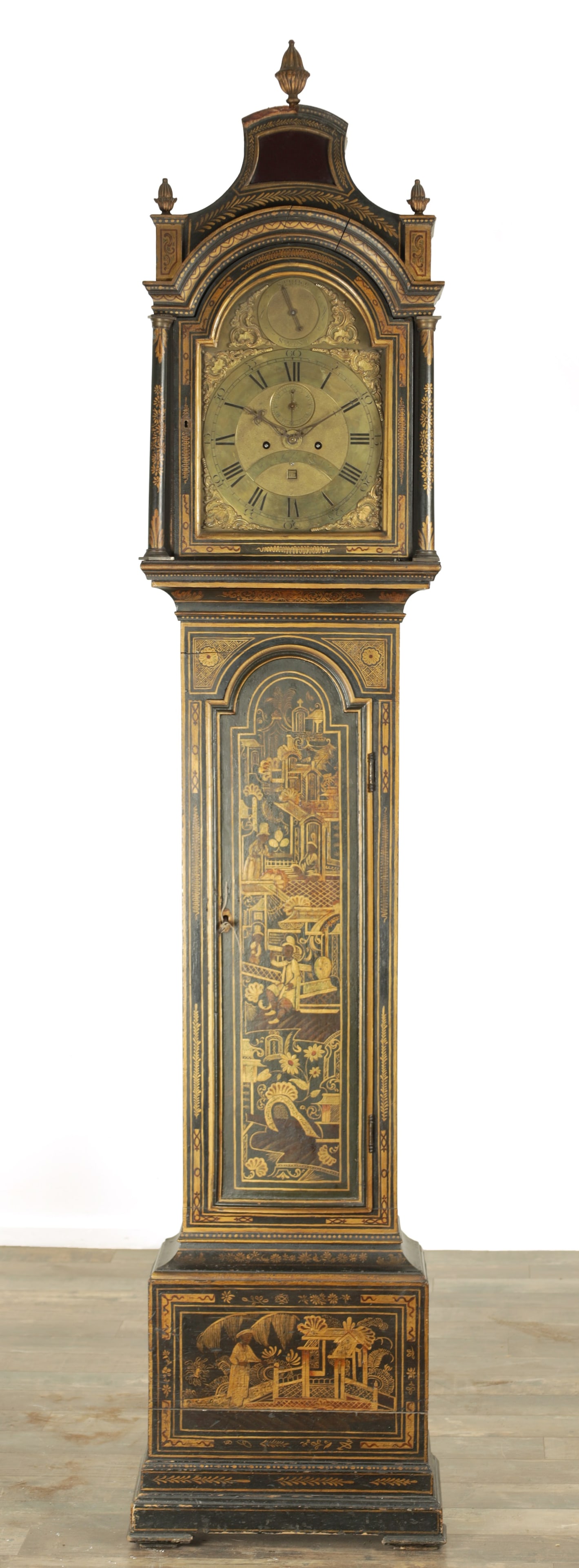 JOHN TAYLOR, LONDON. A GEORGE III GREEN LACQUERED CHINOISERIE LONGCASE CLOCK: JOHN TAYLOR, LONDON. A GEORGE III GREEN LACQUERED CHINOISERIE LONCASE CLOCK having a pagoda top and glazed door on a slender trunk with moulded door and box base covered in gilt decoration depicting f