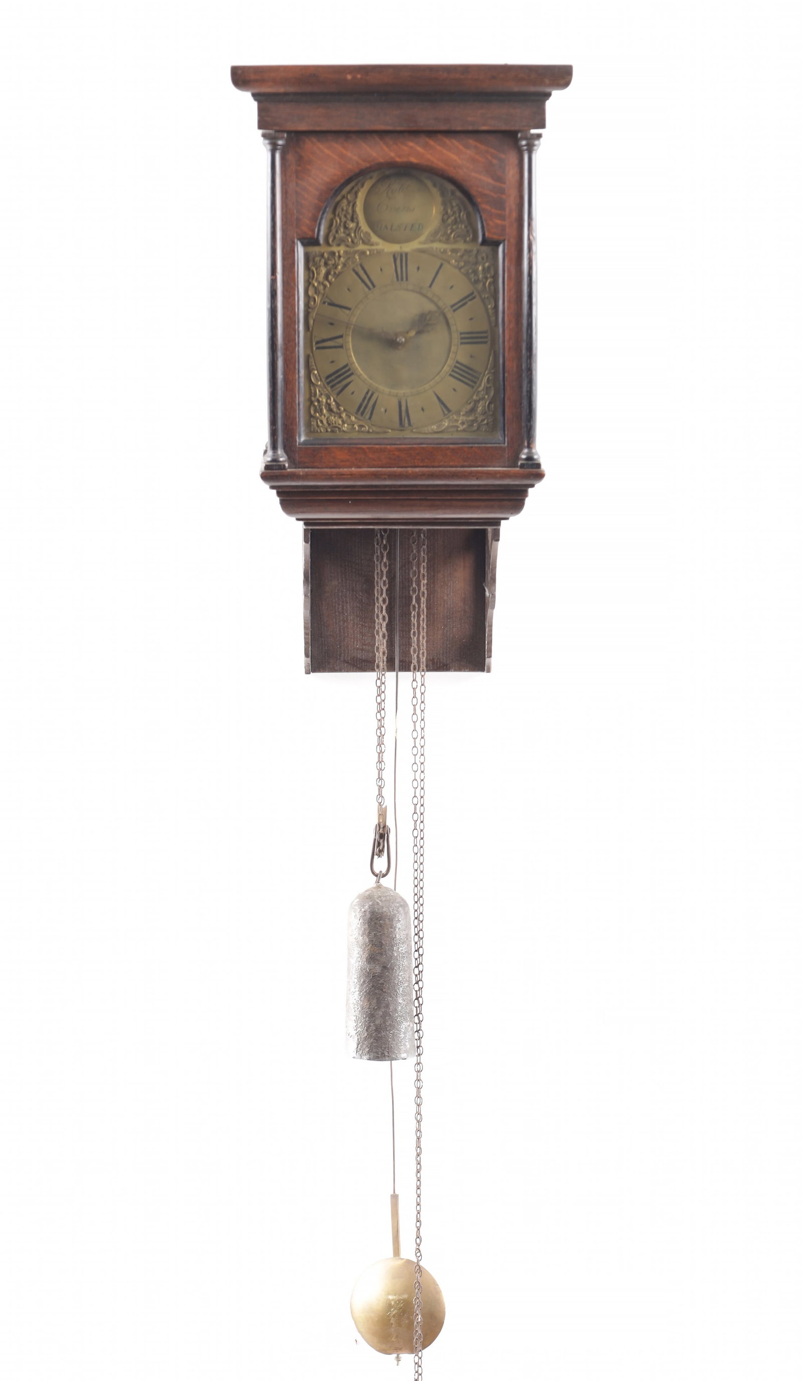 ROBERT EVENS, HALSTEAD. AN 18TH CENTURY OAK CASED HOODED WALL CLOCK: ROBERT EVENS, HALSTEAD. AN 18TH CENTURY OAK CASED HOODED WALL CLOCK having a glazed hood with turned columns and shaped bracket enclosing a 7" arched brass dial with pierced spandrels and Roman numera