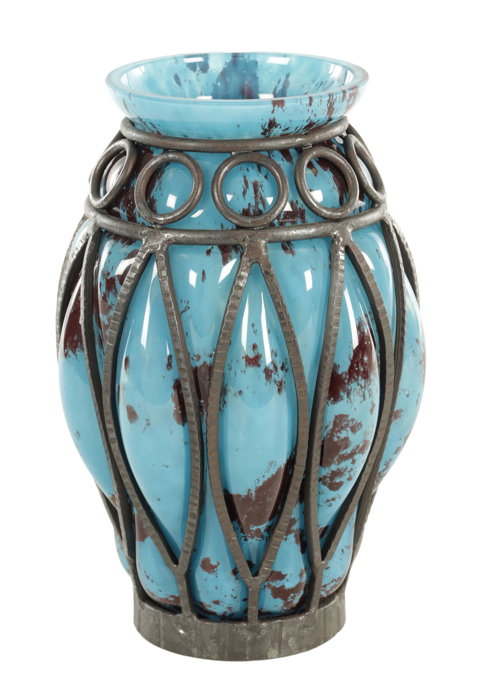 DAUM AND LOUIS MAJORELLE. A FRENCH ART DECO GLASS AND WROUGHT IRON VASE: DAUM AND LOUIS MAJORELLE. A FRENCH ART DECO GLASS AND WROUGHT IRON VASE, having an Art Deco mottled glass vase with inclusions blown into a wrought iron structure. Engraved with the signature to the b