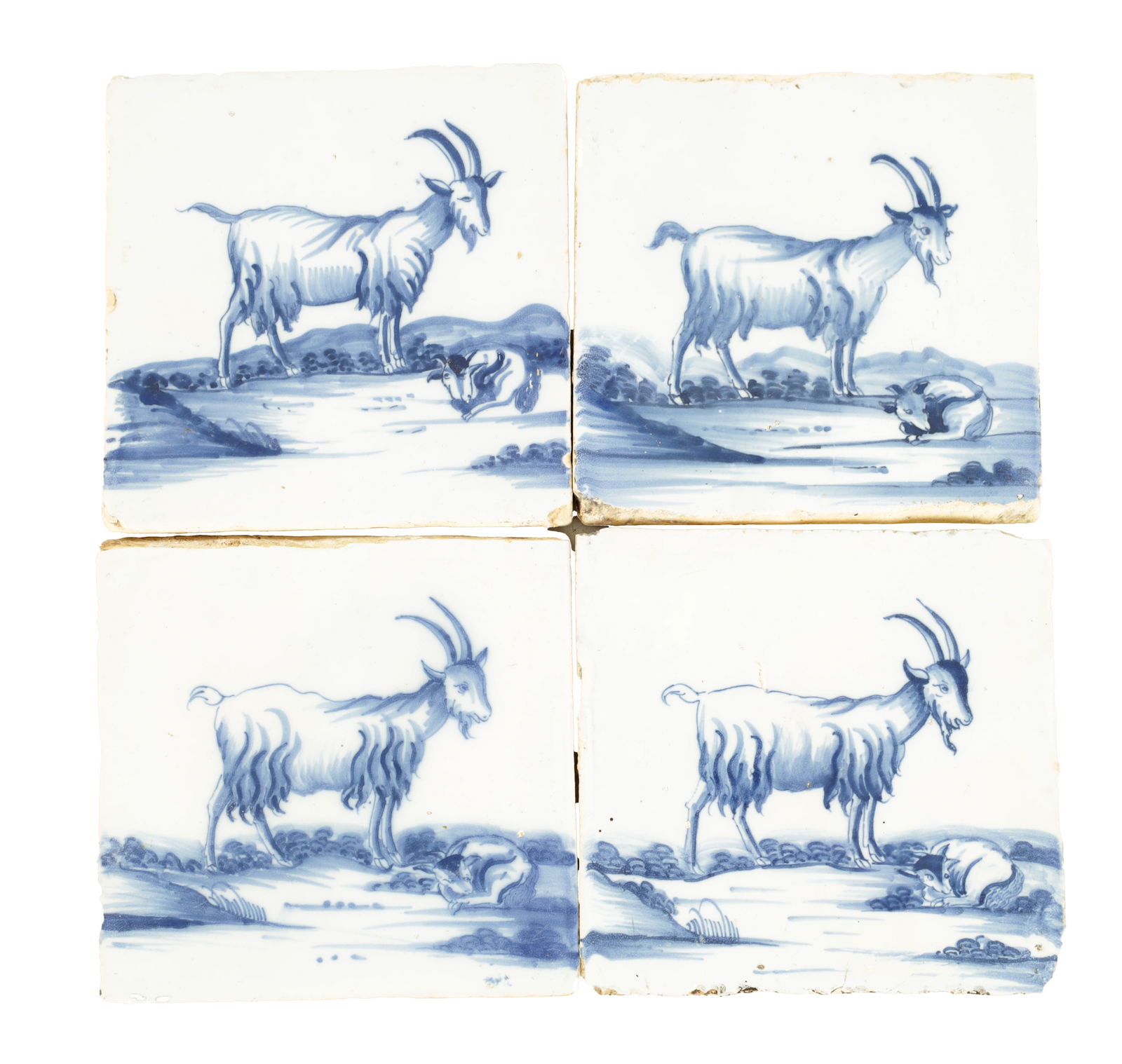 A SET OF FOUR 18TH CENTURY HAND-PAINTED BLUE AND WHITE DELFT TILES: A SET OF FOUR 18TH CENTURY HAND-PAINTED BLUE AND WHITE DELFT TILES depicting Goats (13cm square )